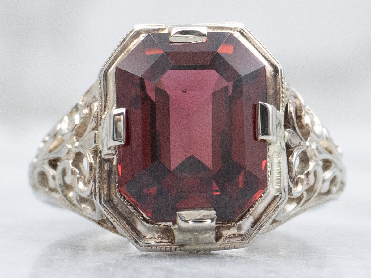 Ornate Art Deco Era White Gold and Garnet Filigree Ring