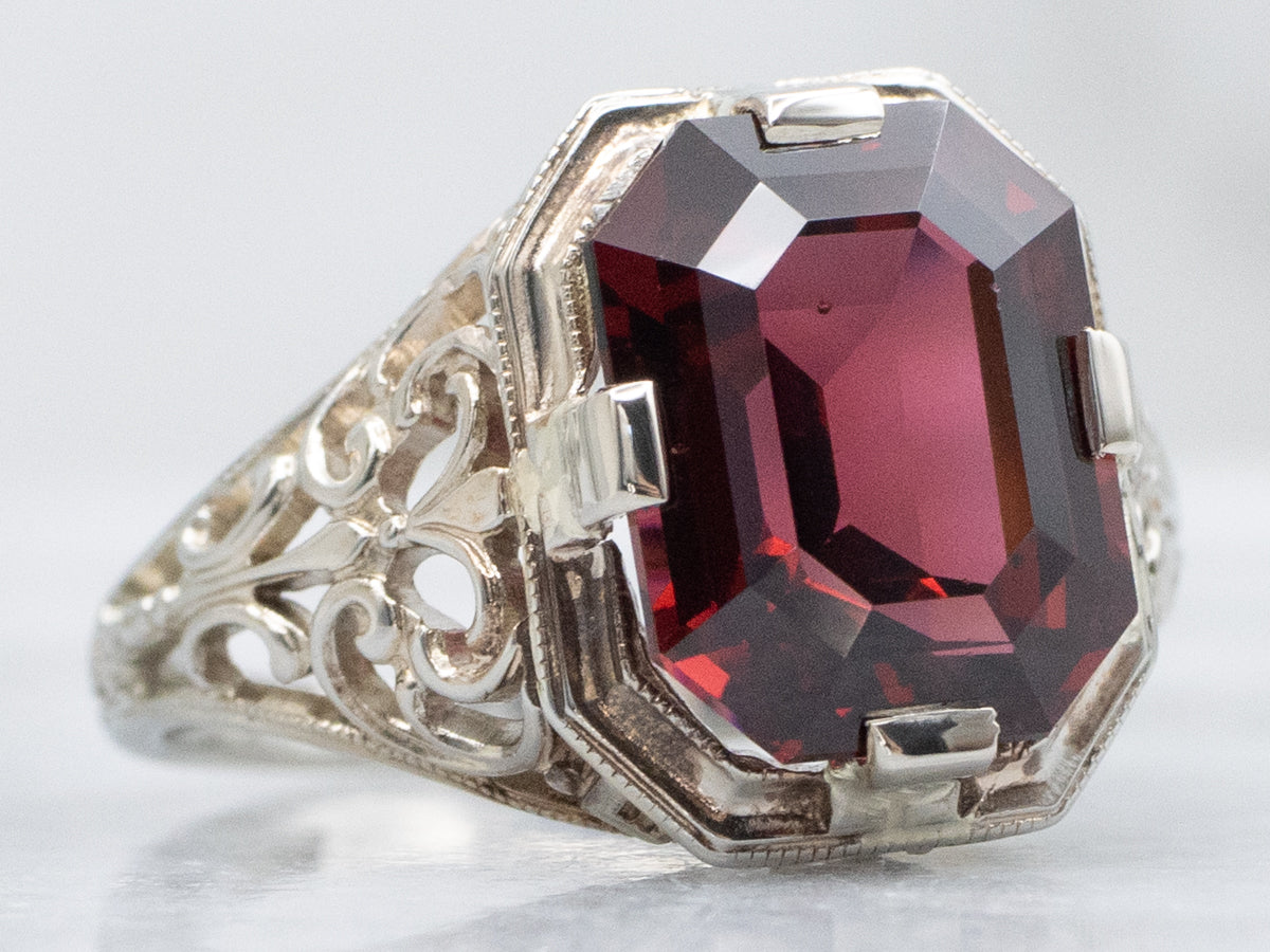 Ornate Art Deco Era White Gold and Garnet Filigree Ring