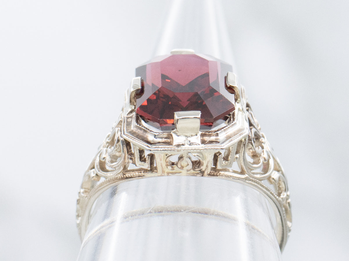 Ornate Art Deco Era White Gold and Garnet Filigree Ring