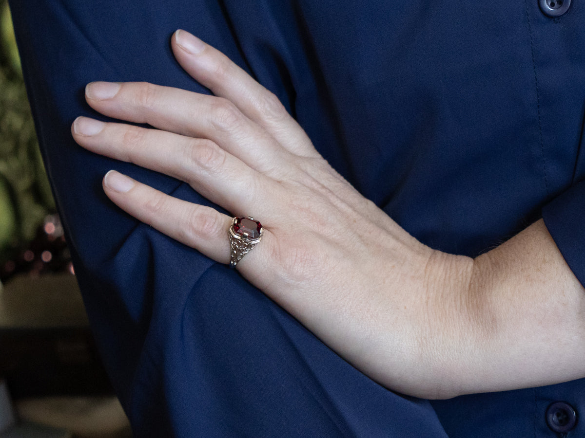 Ornate Art Deco Era White Gold and Garnet Filigree Ring