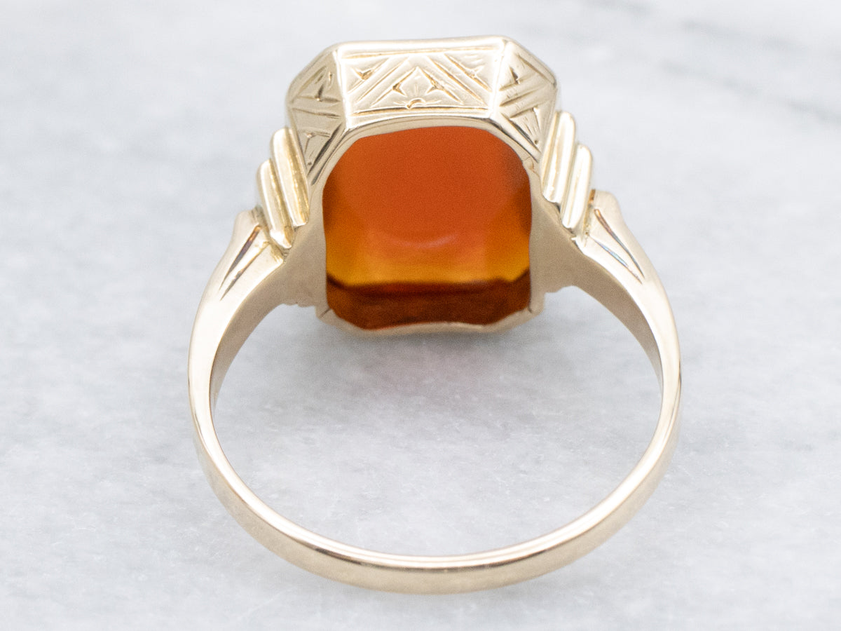 Vintage Gold Solitaire Ring with Faceted Carnelian Center