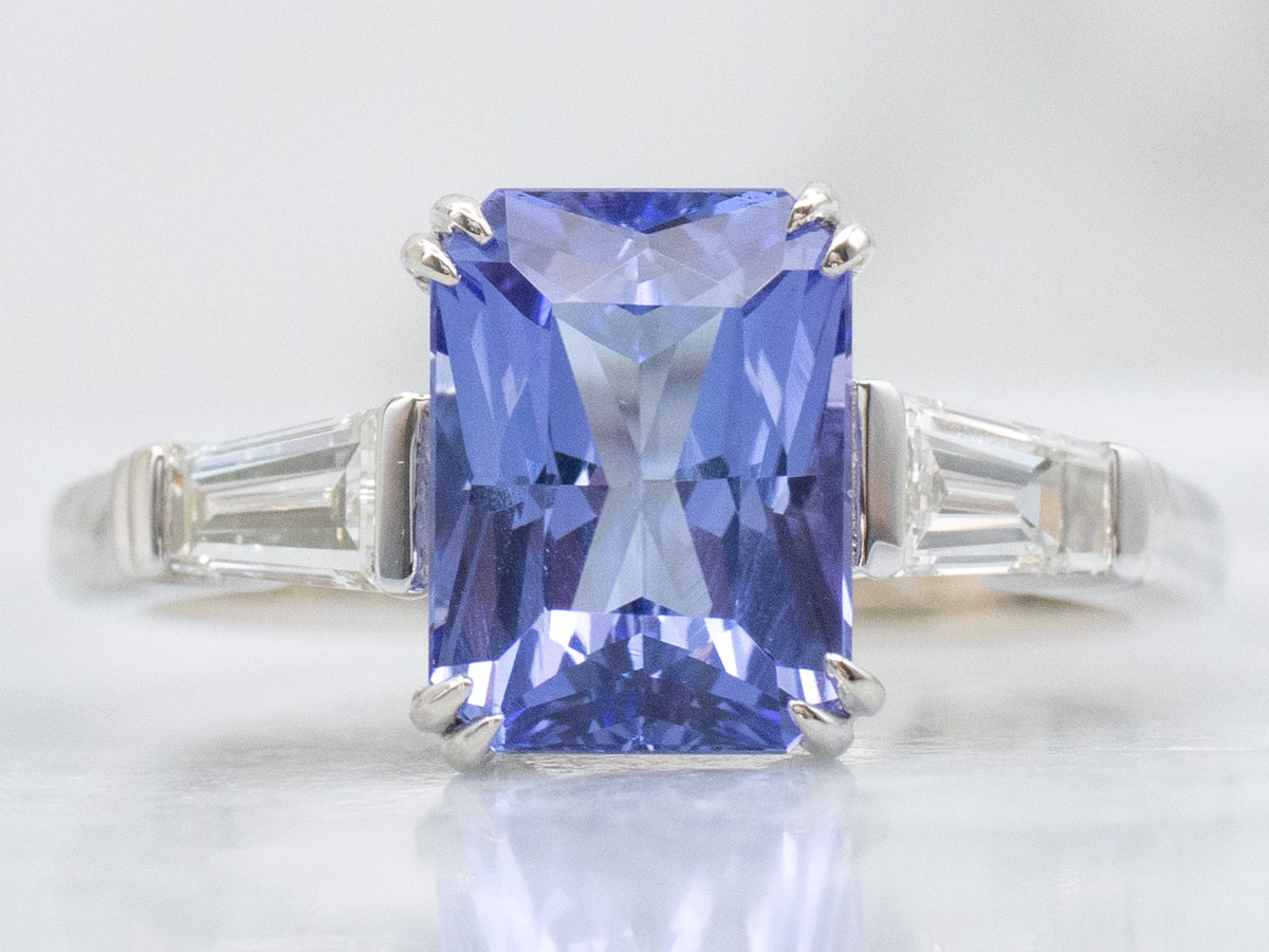 Tanzanite and White Gold Ring with Baguette-Cut Diamond Accent