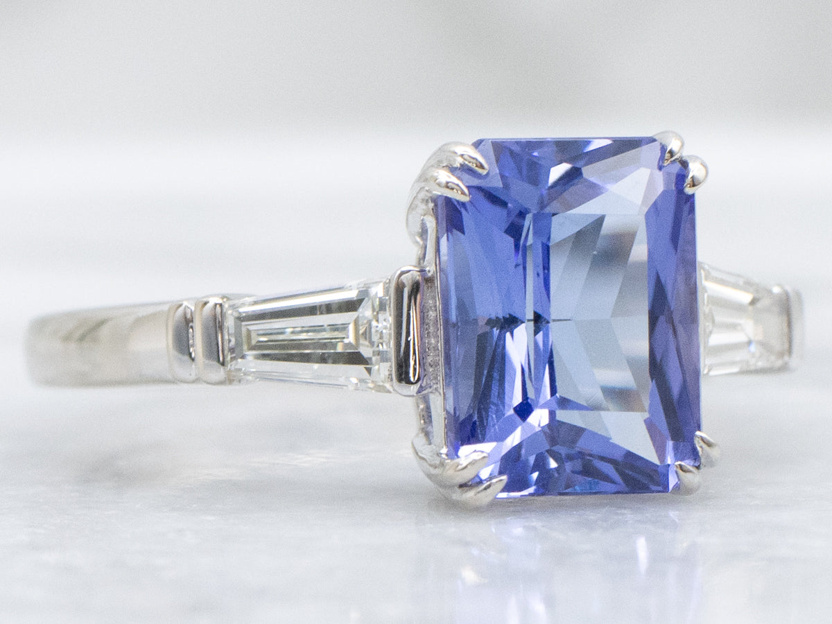 Tanzanite and White Gold Ring with Baguette-Cut Diamond Accent
