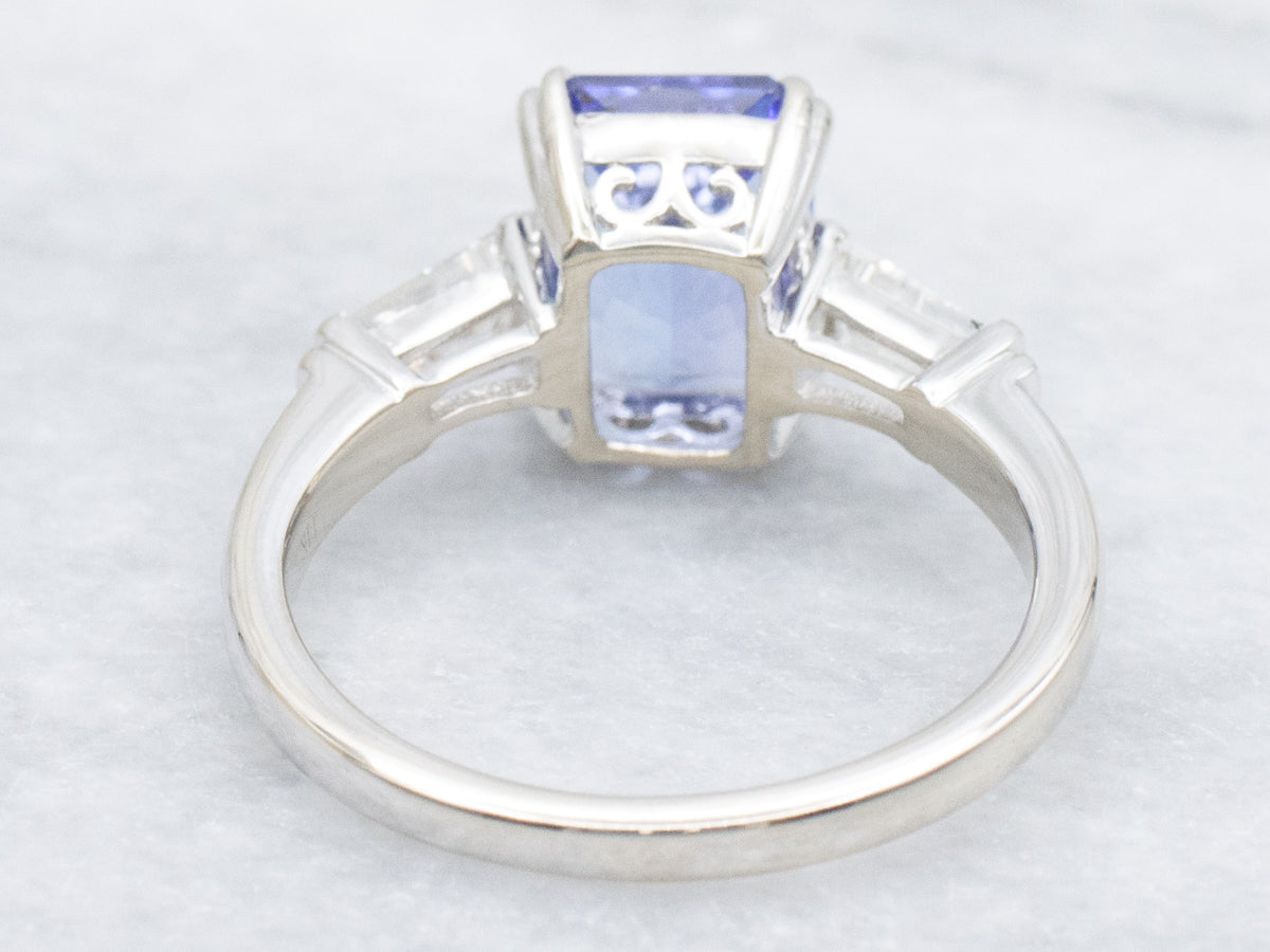 Tanzanite and White Gold Ring with Baguette-Cut Diamond Accent