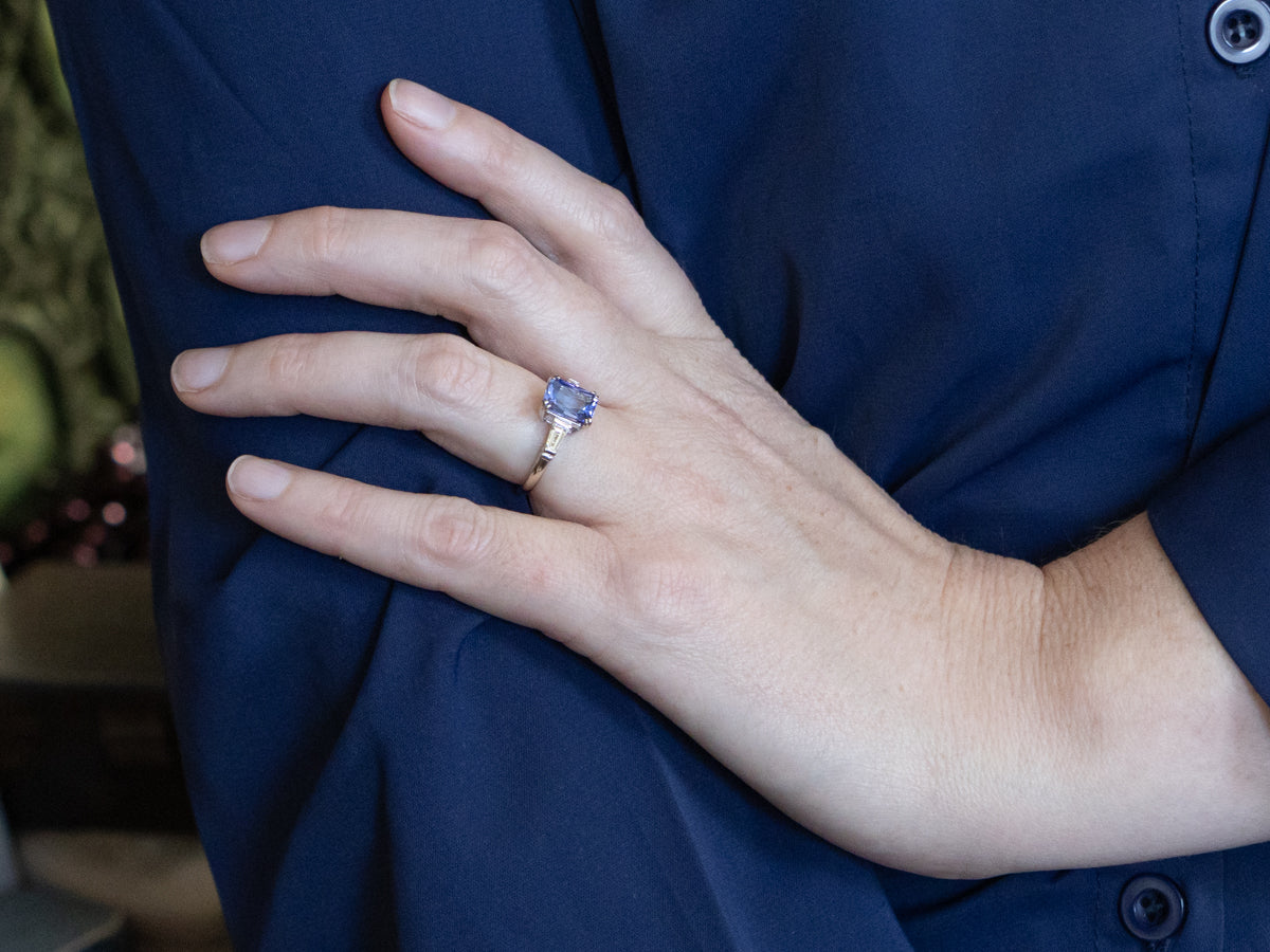 Tanzanite and White Gold Ring with Baguette-Cut Diamond Accent
