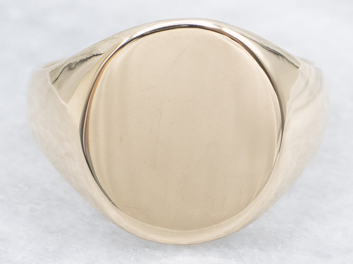 Plain Oval-Top Yellow Gold Signet Ring