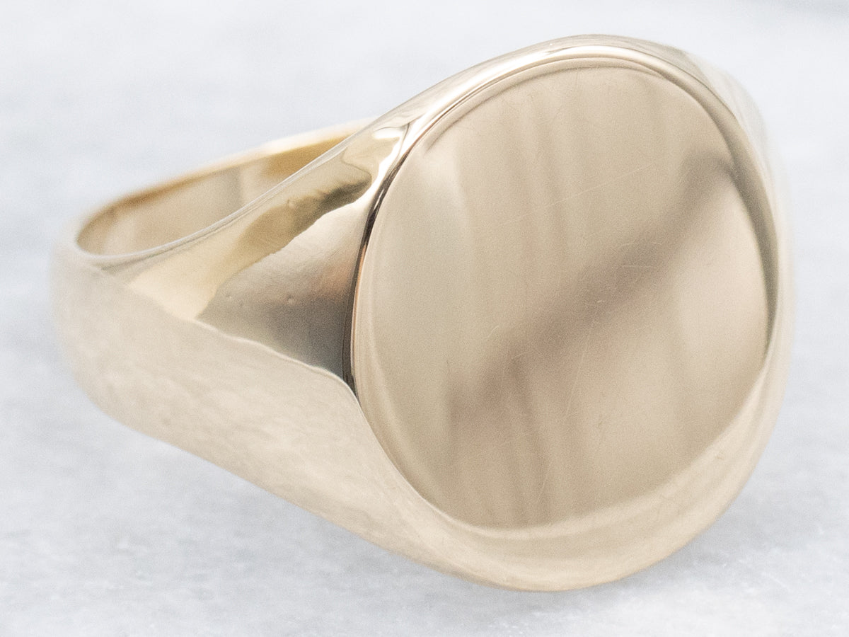 Plain Oval-Top Yellow Gold Signet Ring