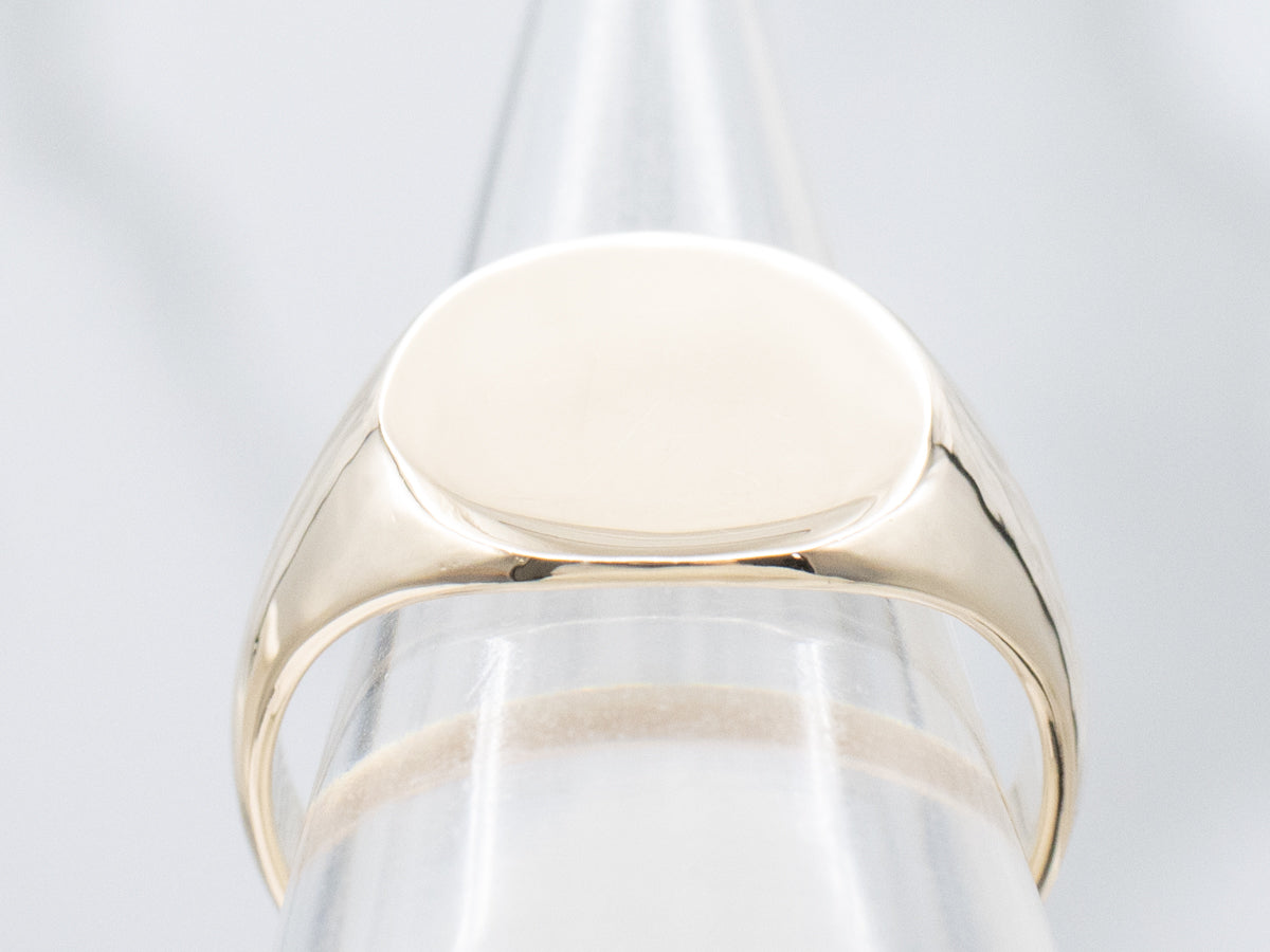 Plain Oval-Top Yellow Gold Signet Ring