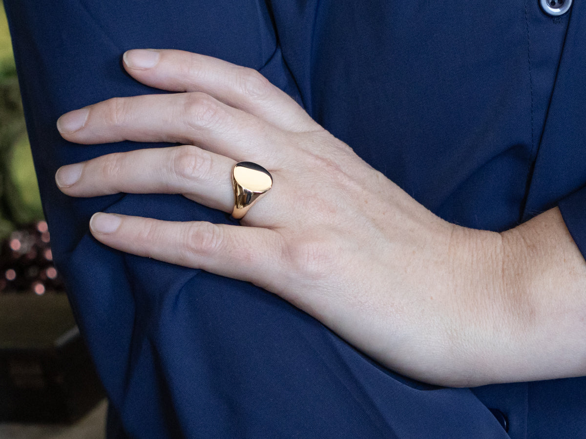 Plain Oval-Top Yellow Gold Signet Ring