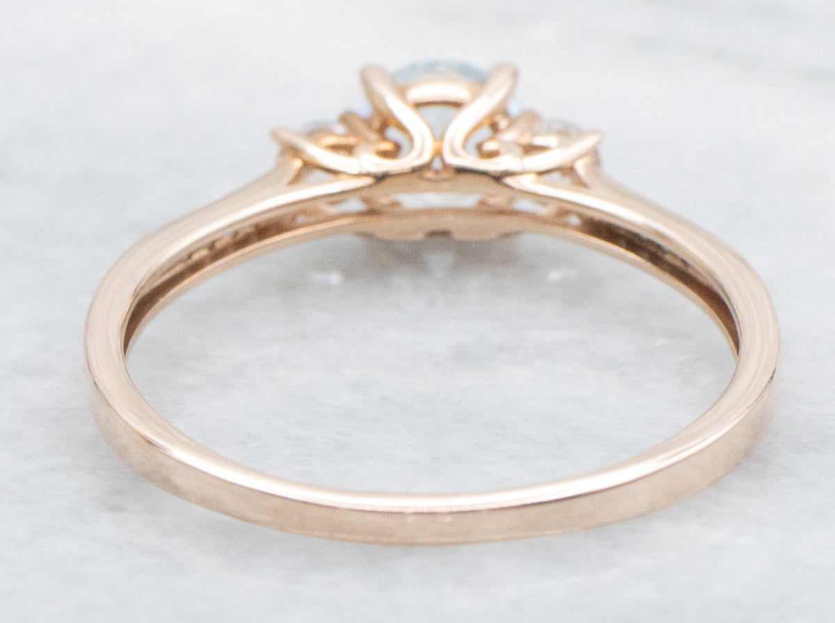 Aquamarine and White Sapphire Rose Gold Ring with Diamond Accents
