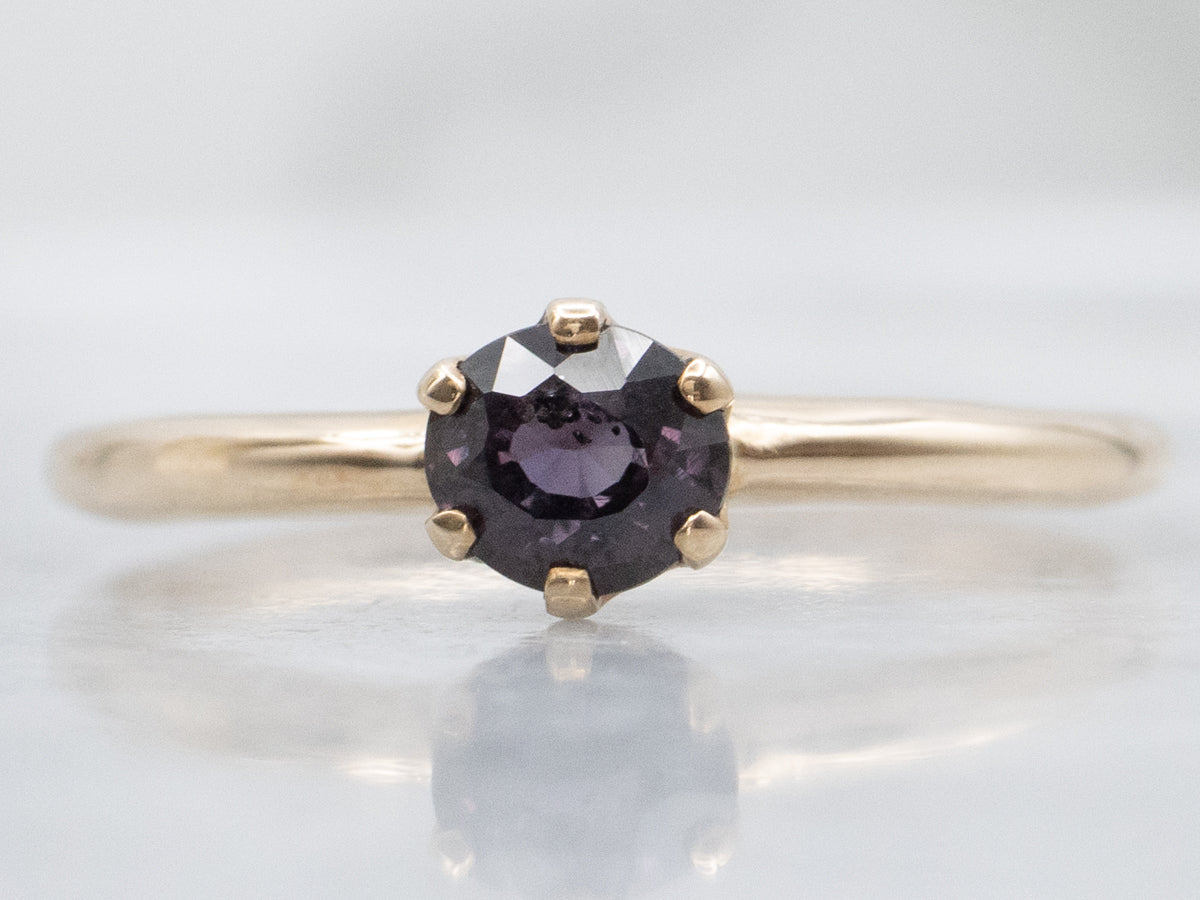 Dark Pink Sapphire and Gold Solitaire Ring
