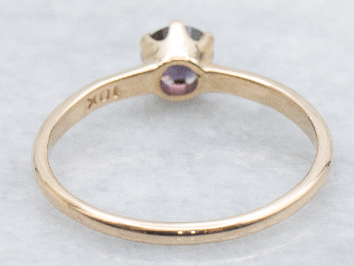 Dark Pink Sapphire and Gold Solitaire Ring