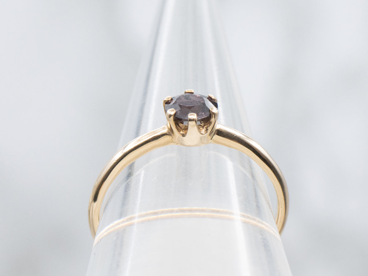 Dark Pink Sapphire and Gold Solitaire Ring