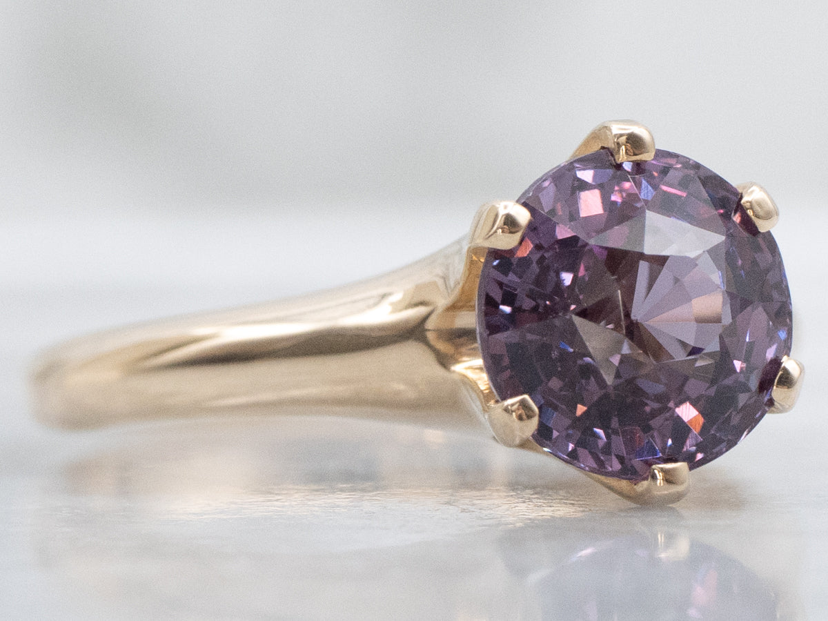 Color-Changing Garnet Six-Prong Gold Solitaire Ring