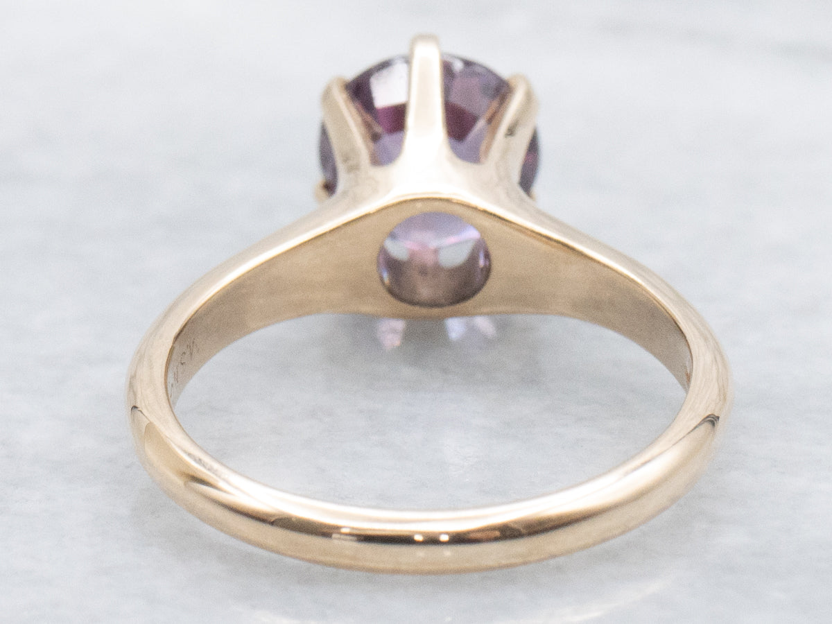 Color-Changing Garnet Six-Prong Gold Solitaire Ring