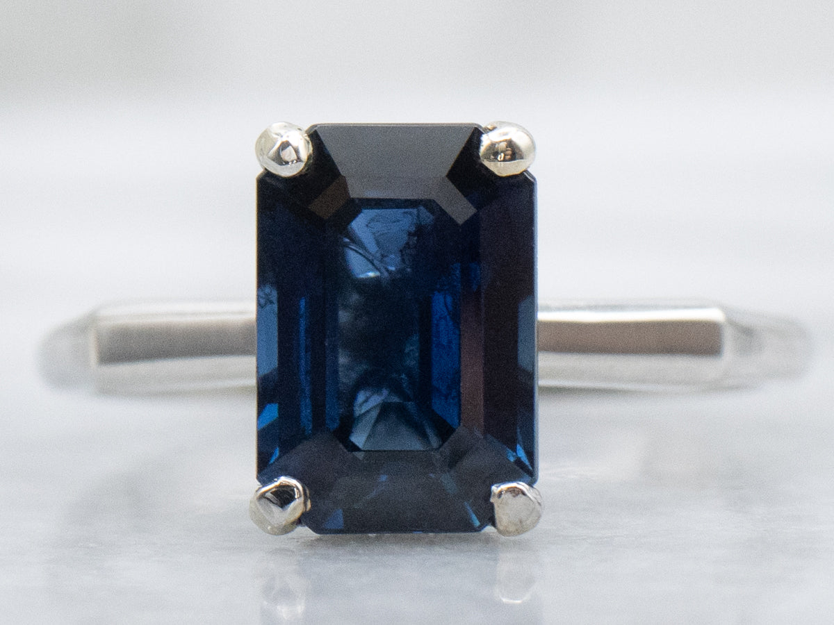 Platinum Sapphire Engagement Ring with Hidden Diamond Halo