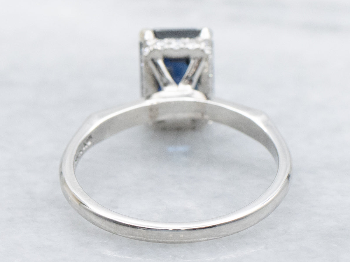 Platinum Sapphire Engagement Ring with Hidden Diamond Halo