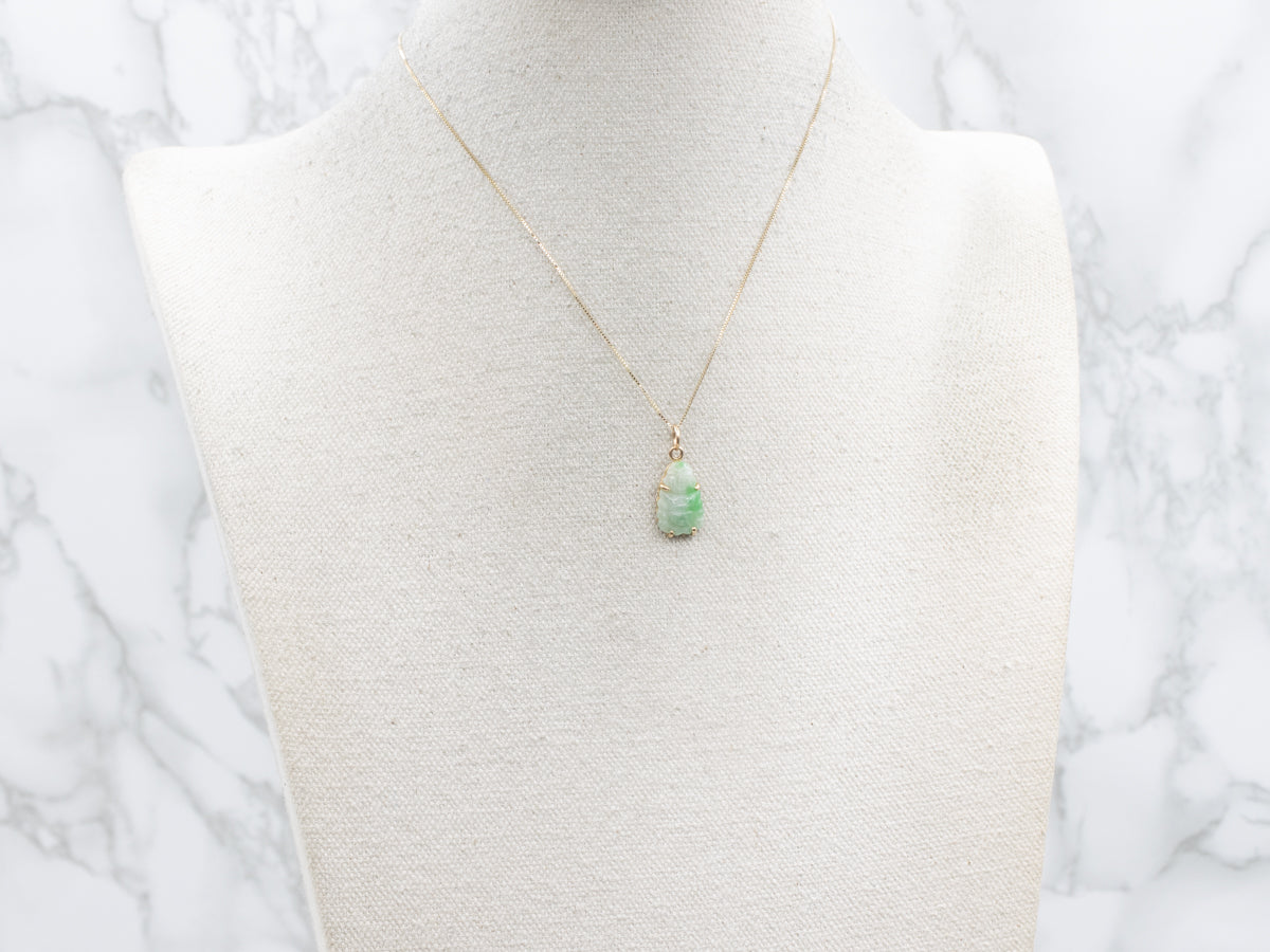 Carved Jadeite Buddha and Gold Pendant
