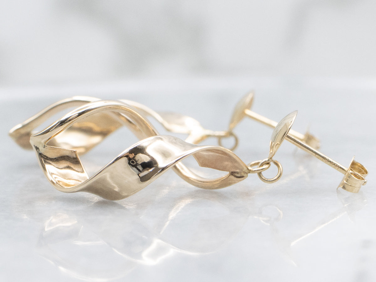 Twisting Polished Gold Swirl Ribbon Drop Earrings