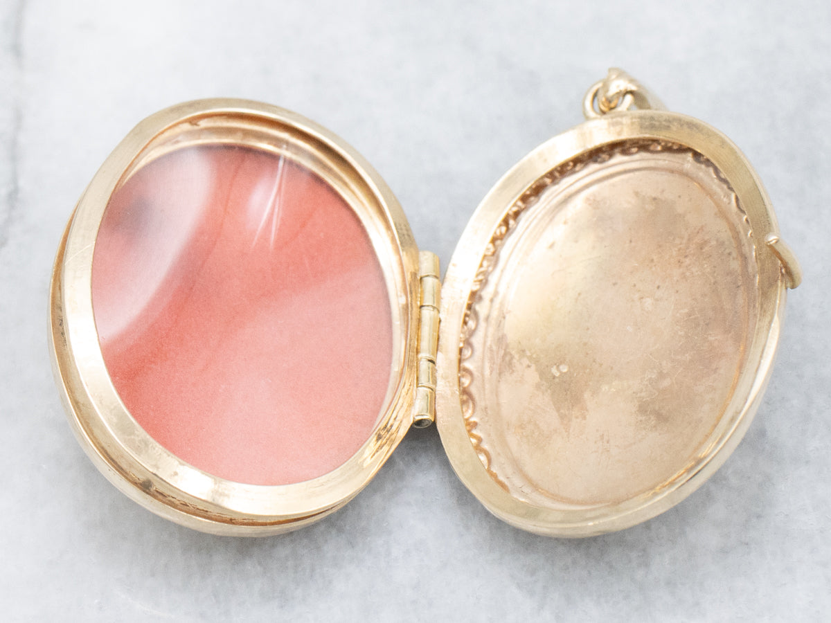 Vintage Engraved Yellow Gold Oval Locket