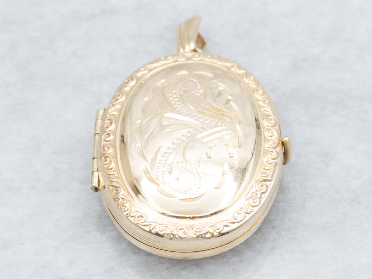 Vintage Engraved Yellow Gold Oval Locket