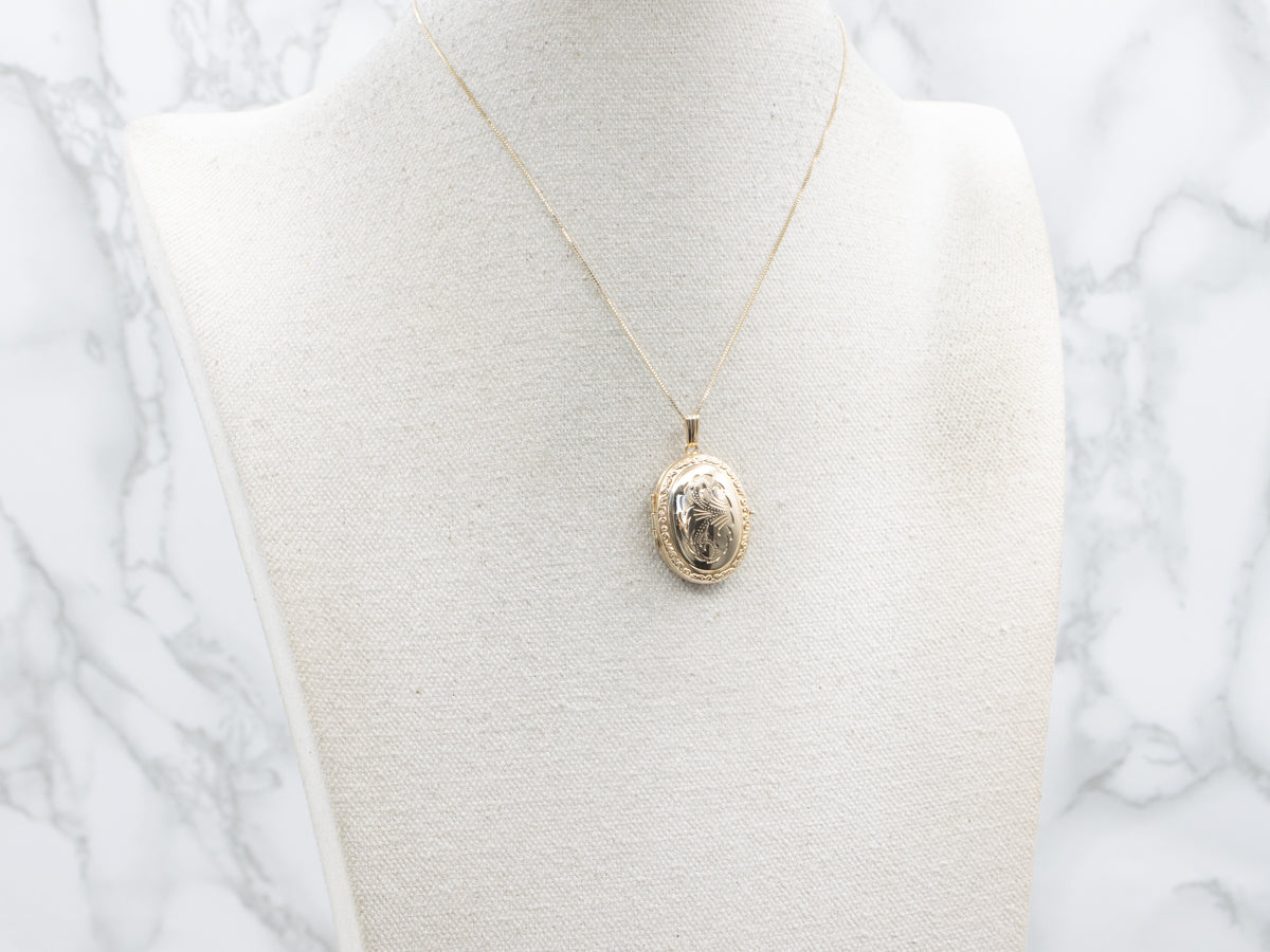 Vintage Engraved Yellow Gold Oval Locket