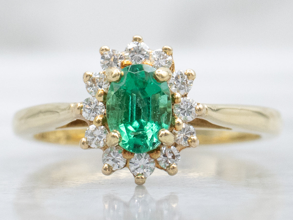 Classic 18-Karat Yellow Gold Emerald and Diamond Halo Ring
