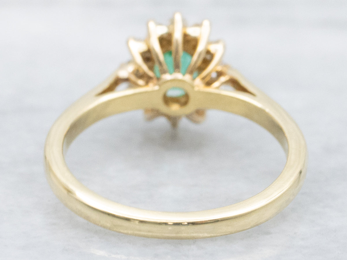 Classic 18-Karat Yellow Gold Emerald and Diamond Halo Ring