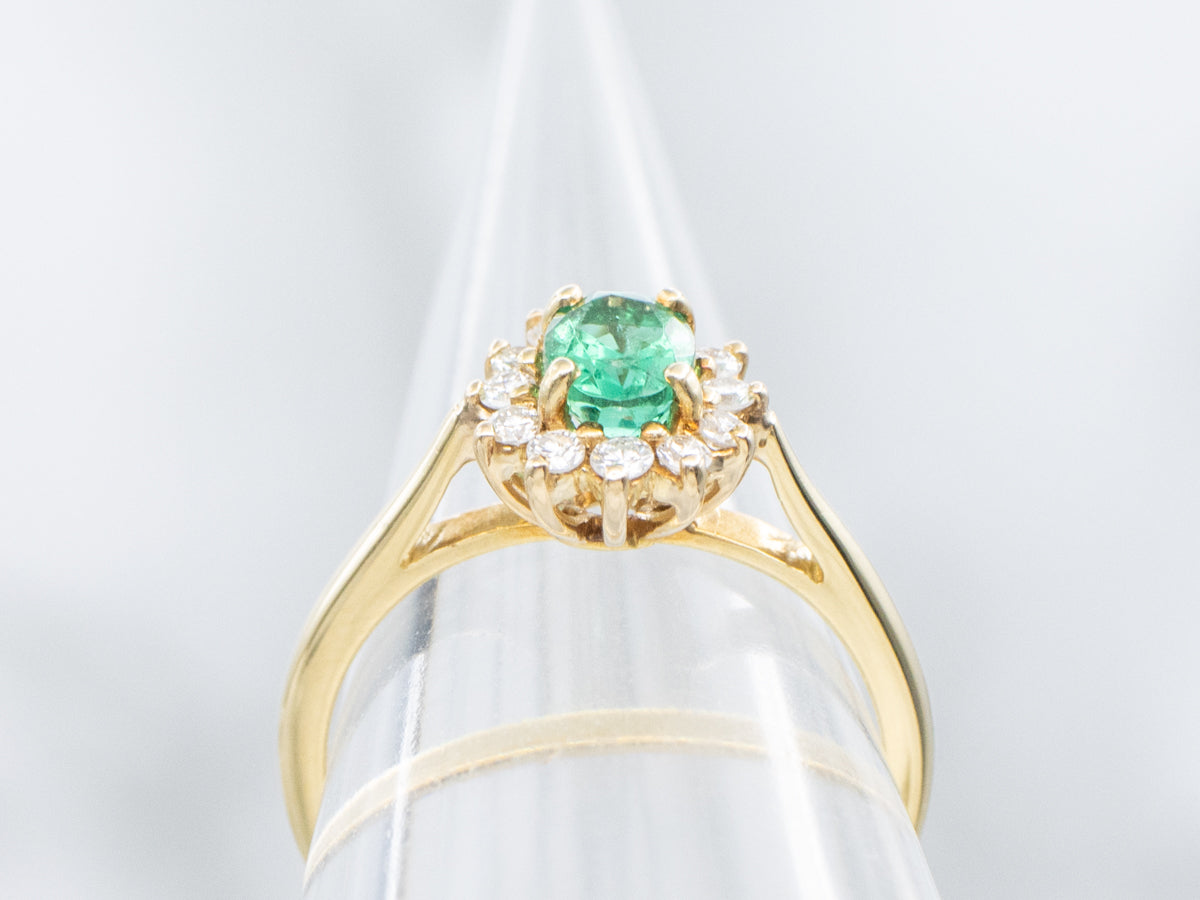 Classic 18-Karat Yellow Gold Emerald and Diamond Halo Ring