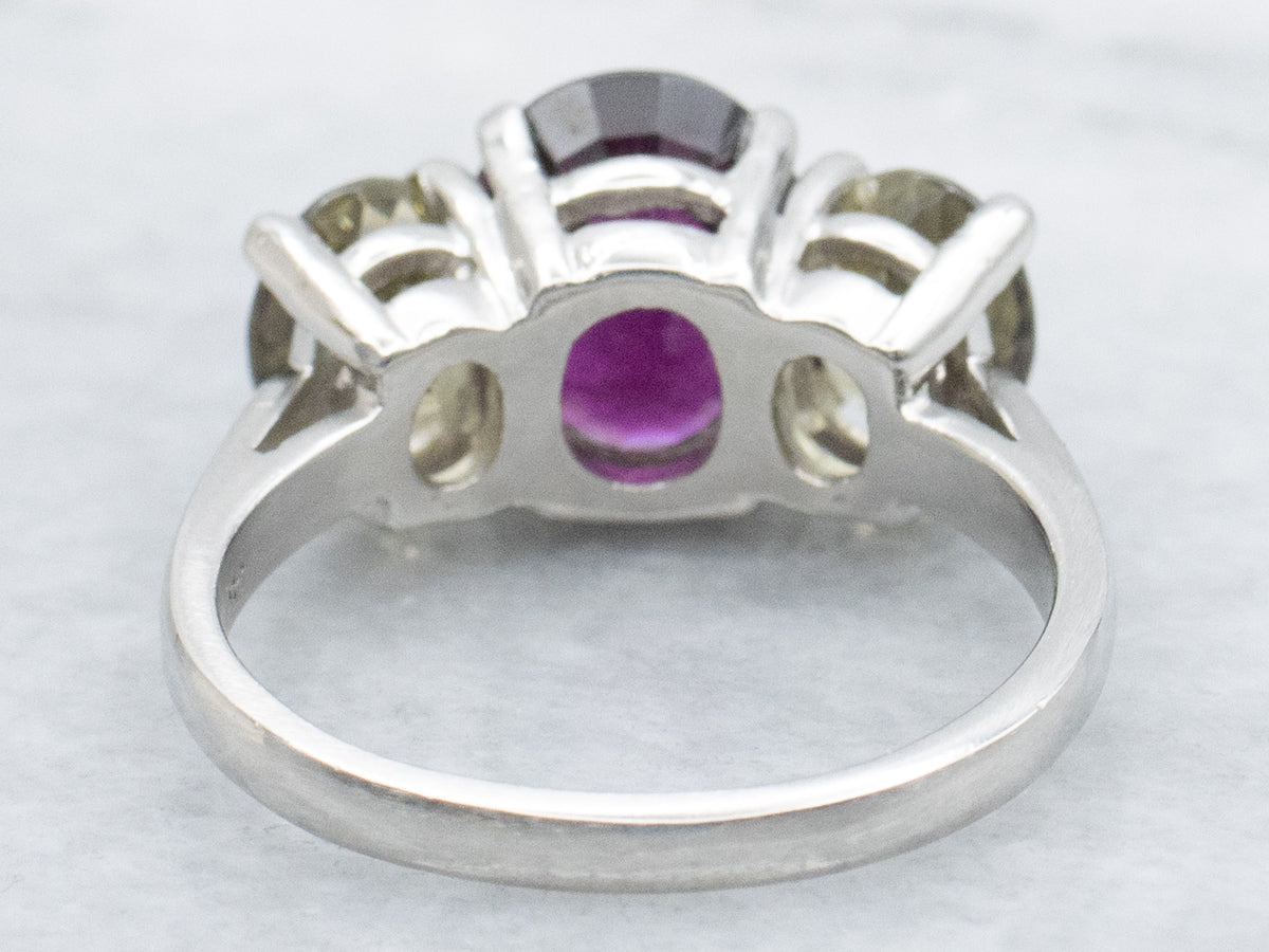 Platinum Rhodolite Garnet and Green Kornerupine Three-Stone Ring