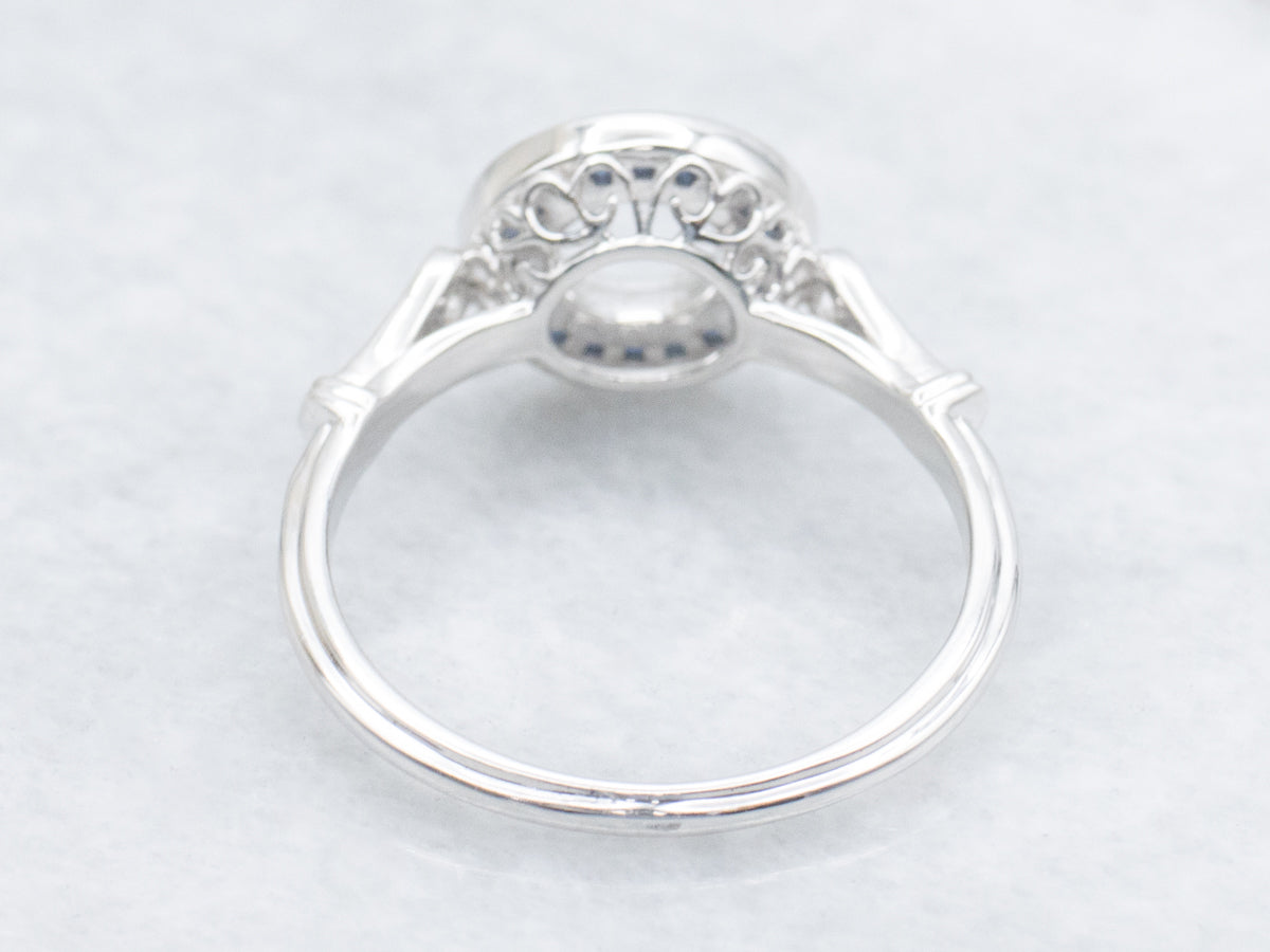 The Fairway Sapphire and Diamond Halo Semi-Mount Ring