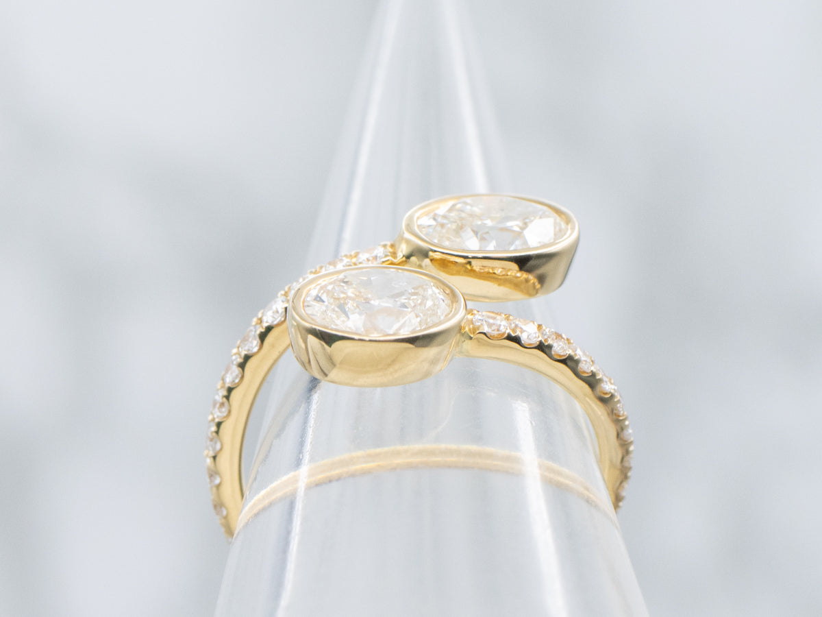Modern 18-Karat Gold Oval-Cut Diamond Bypass Ring