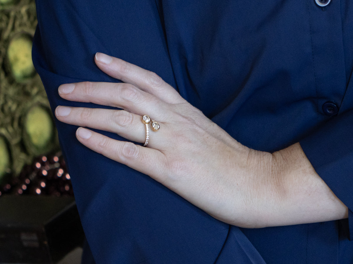 Modern 18-Karat Gold Oval-Cut Diamond Bypass Ring