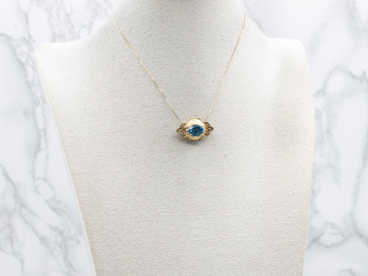 Colgante deslizante adornado con topacio azul