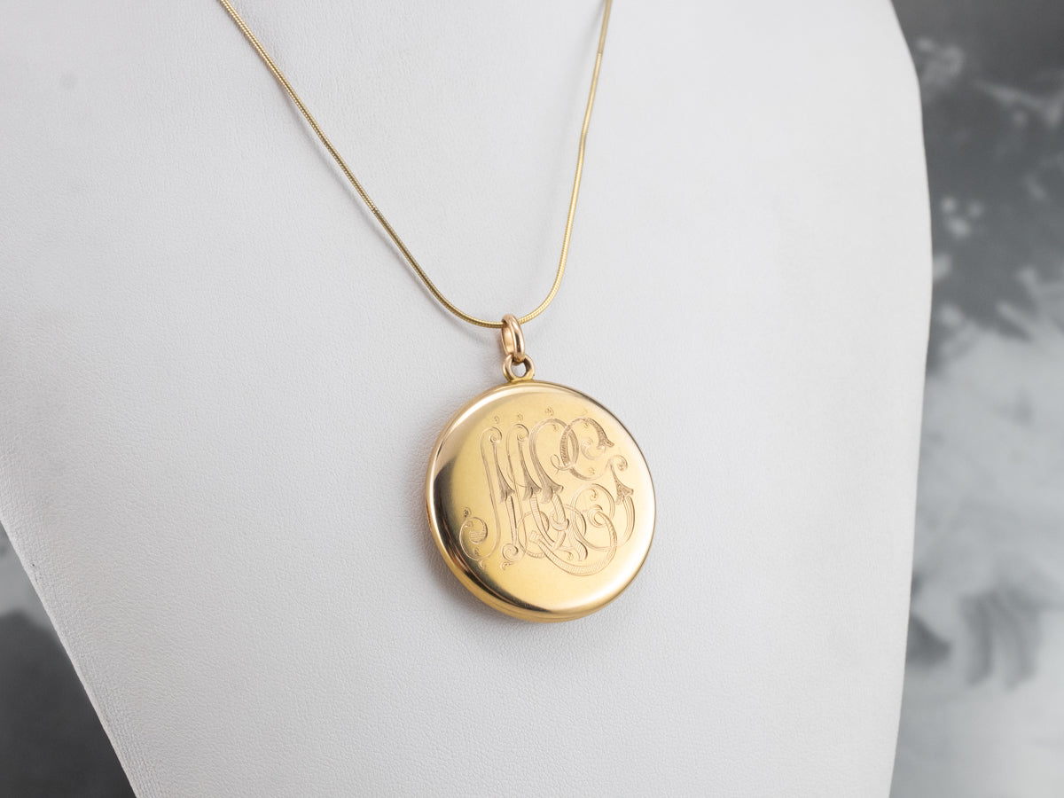 Medallón con monograma "MPG" victoriano de oro florecido