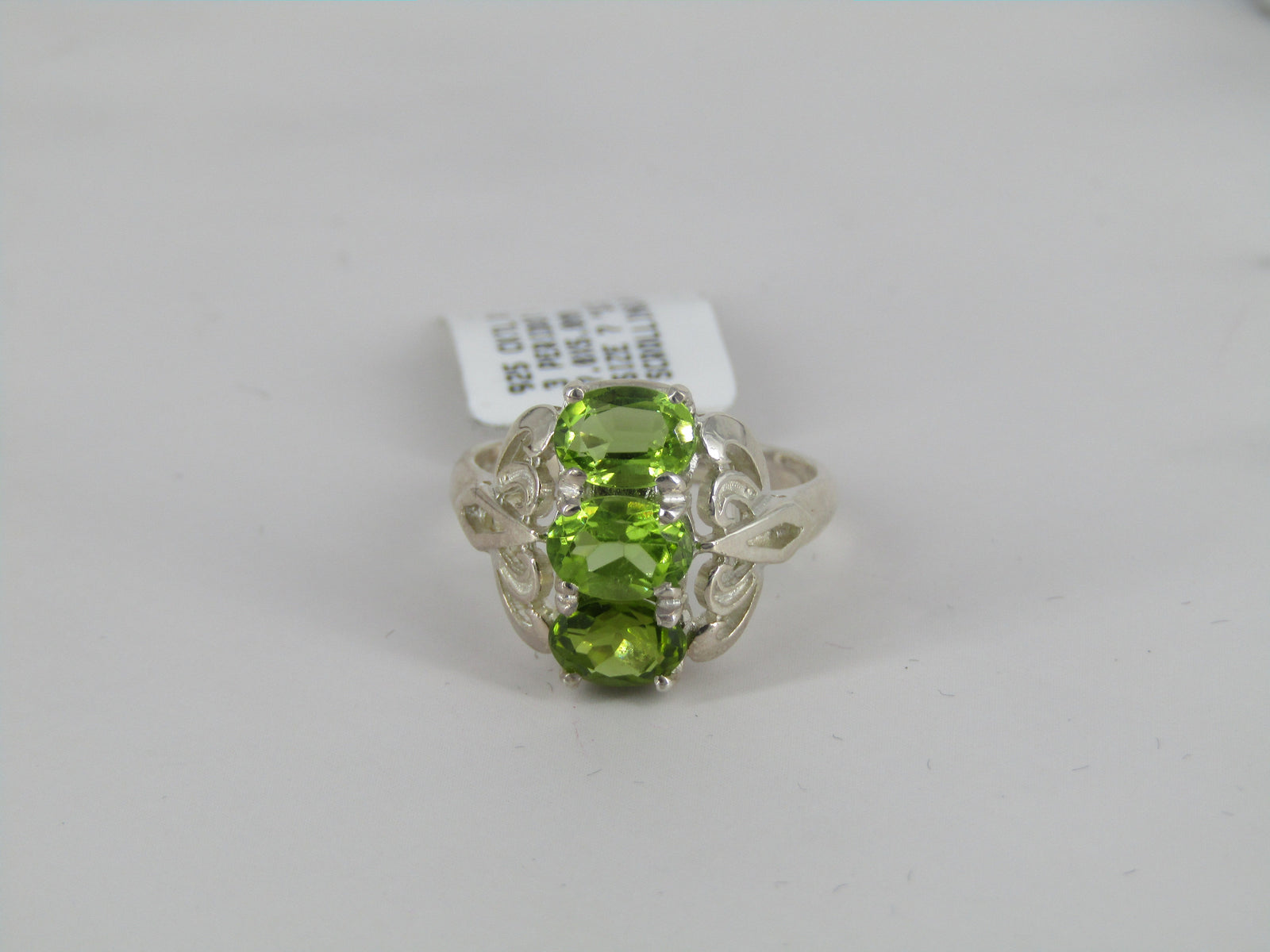 Scrolling Three Stone Silver Peridot Ring
