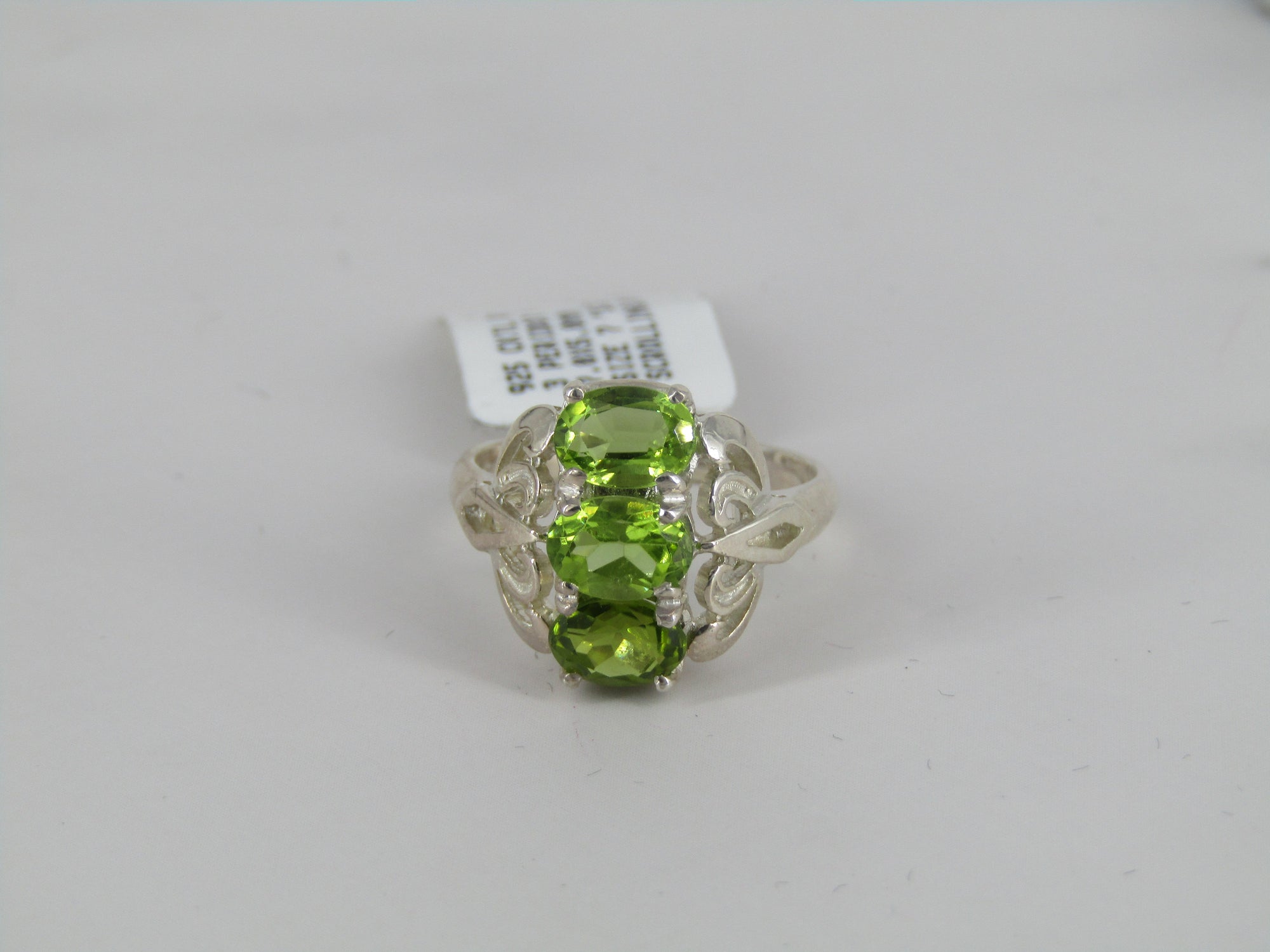 Scrolling Three Stone Silver Peridot Ring