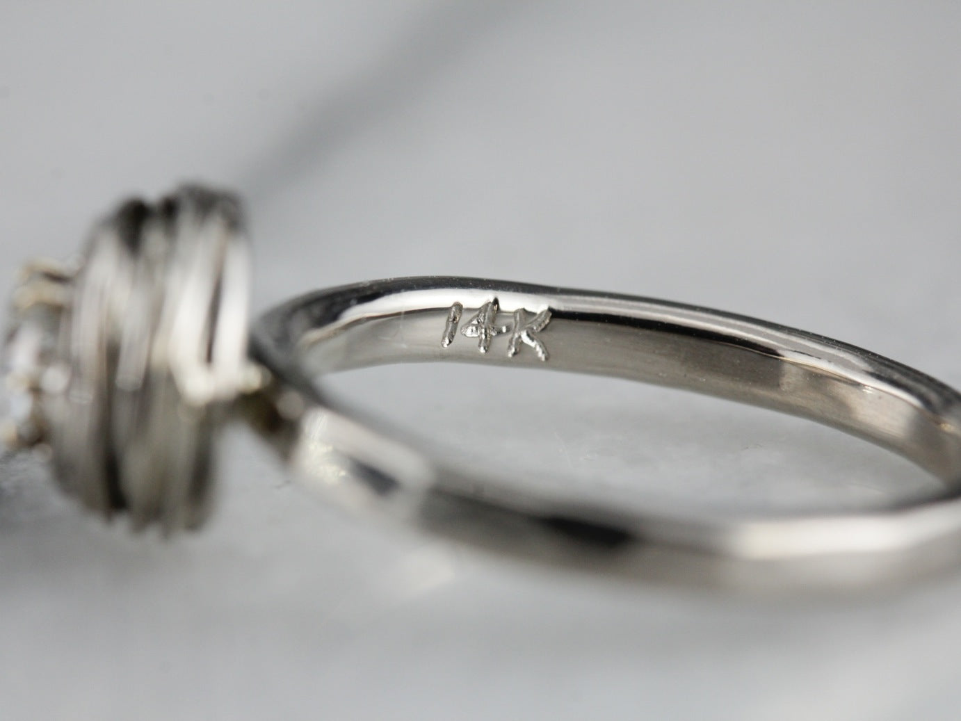 Modernist Diamond Nest Solitaire Engagement Ring