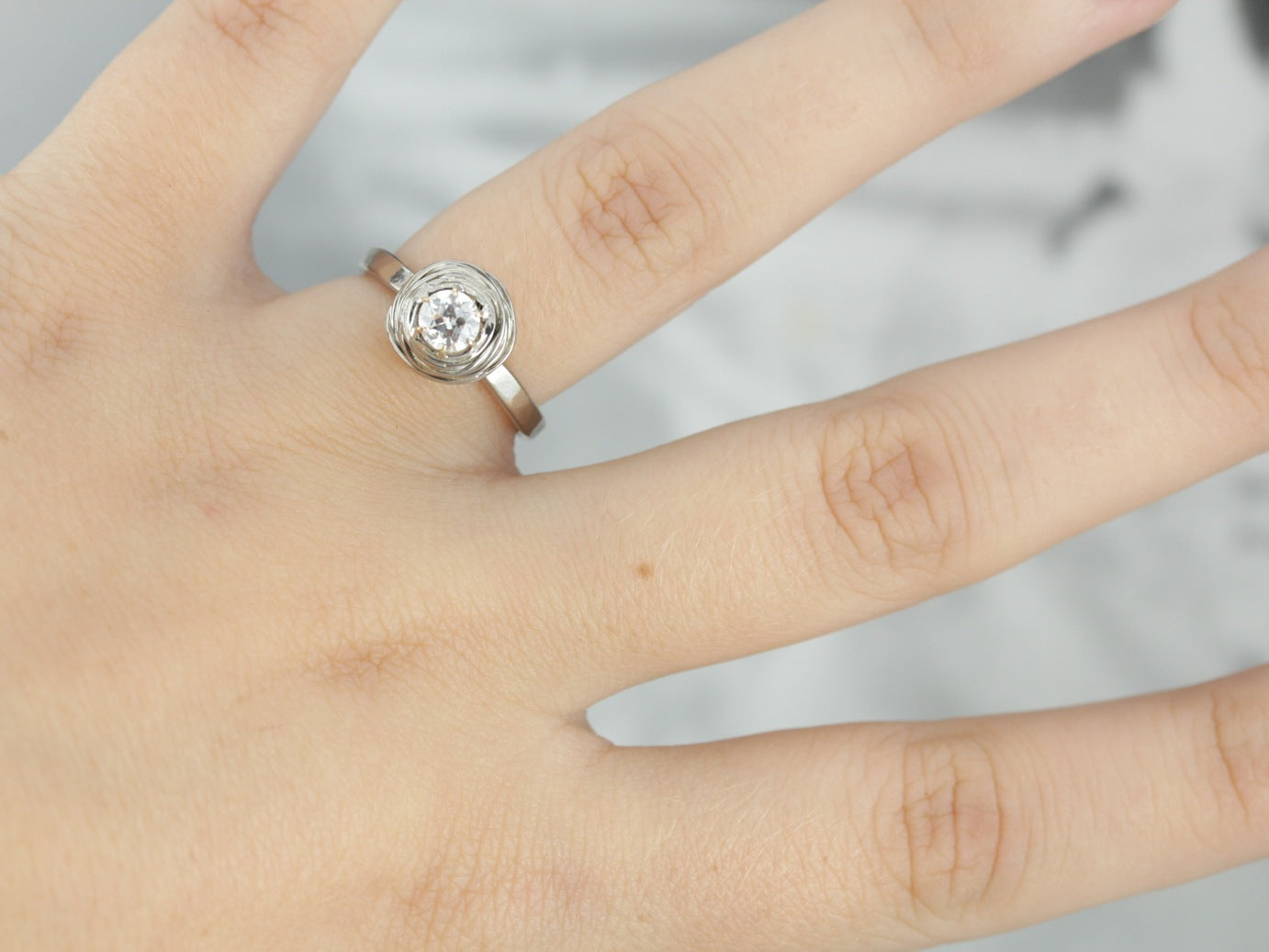 Modernist Diamond Nest Solitaire Engagement Ring