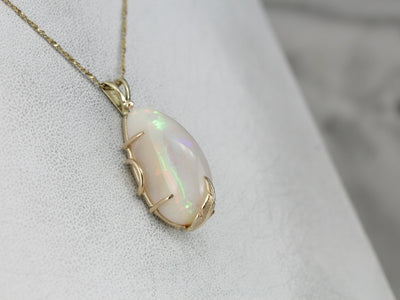 Fancy Cut Opal Gold Pendant