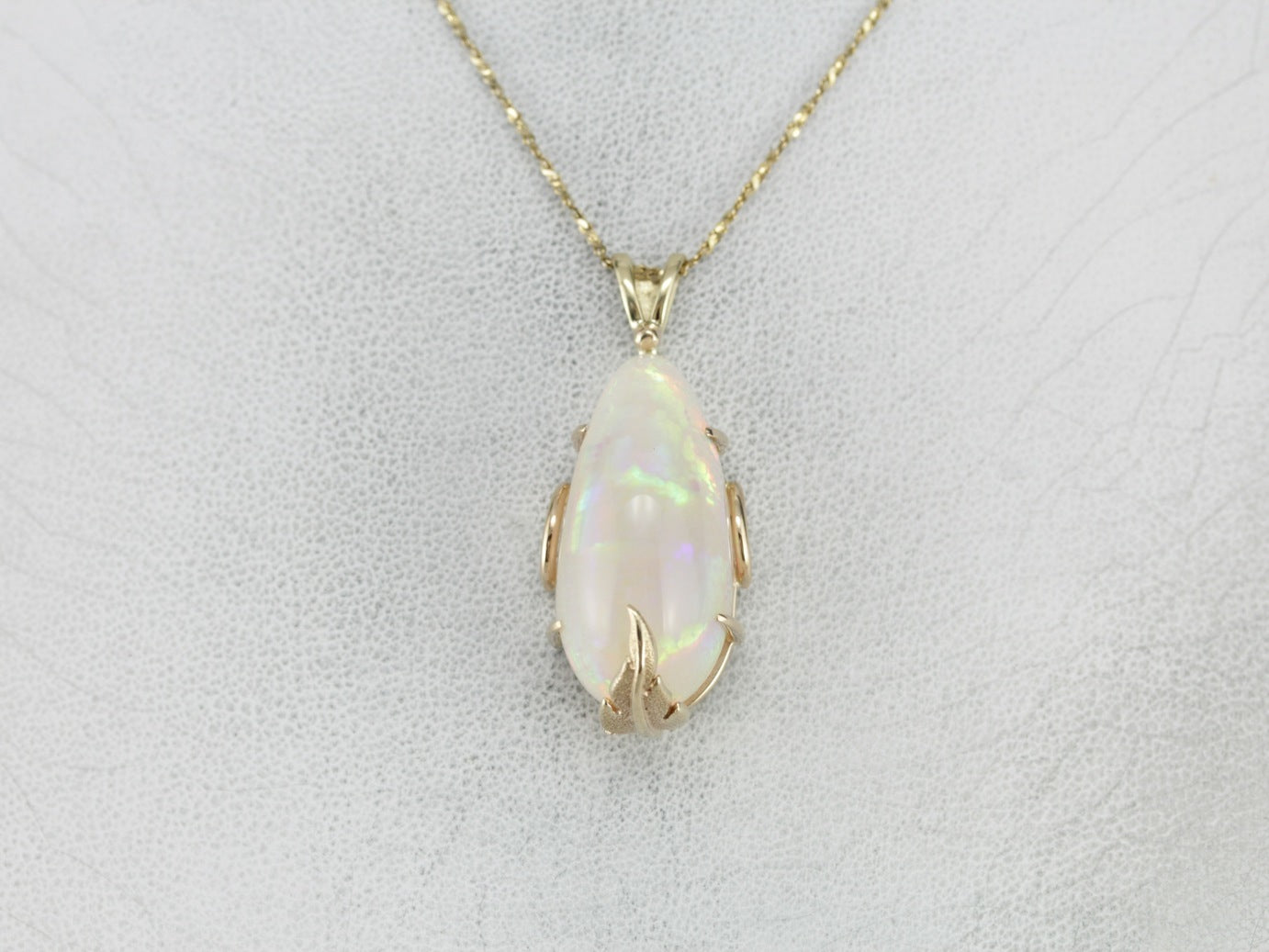 Fancy Cut Opal Gold Pendant