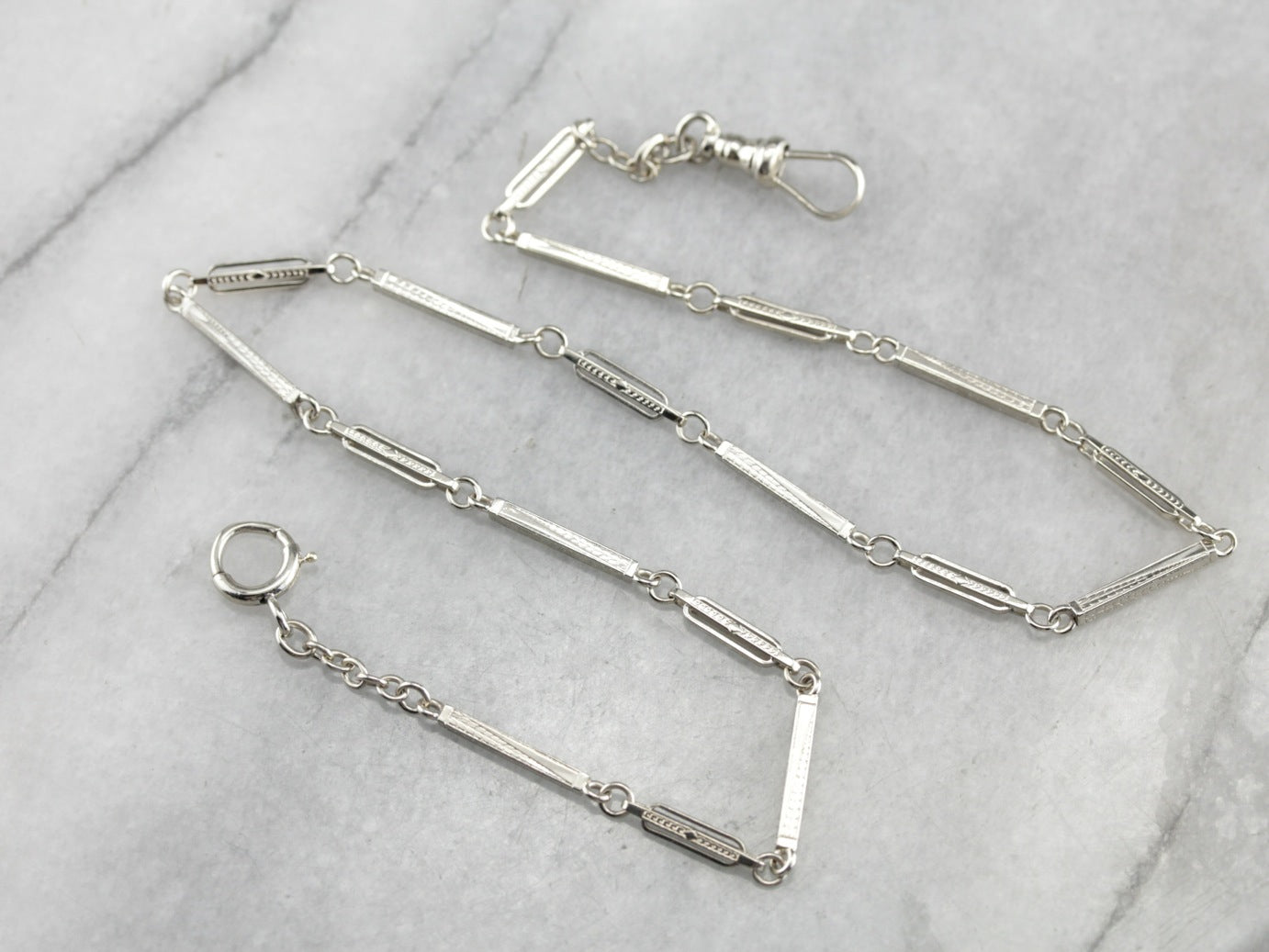 Cadena de reloj de bolsillo Art Déco de oro blanco