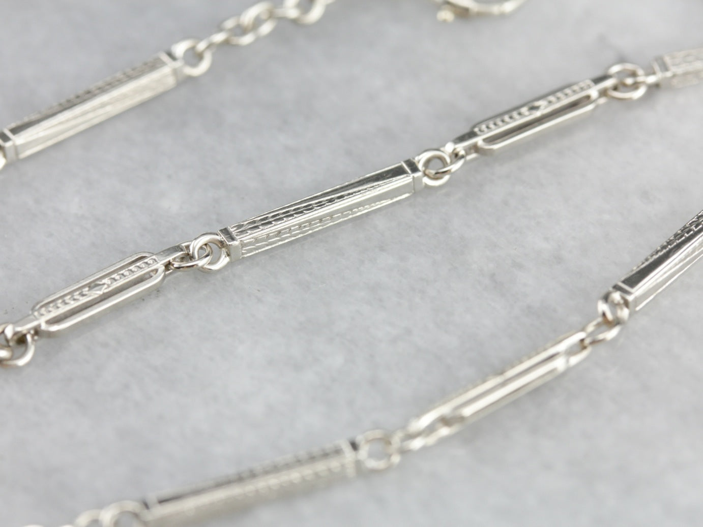 Cadena de reloj de bolsillo Art Déco de oro blanco