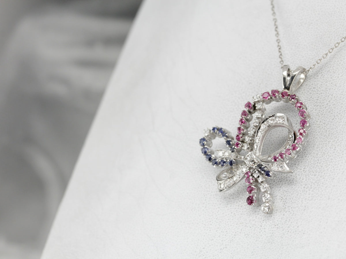 Retro Era Platinum and Diamond Bow Pendant