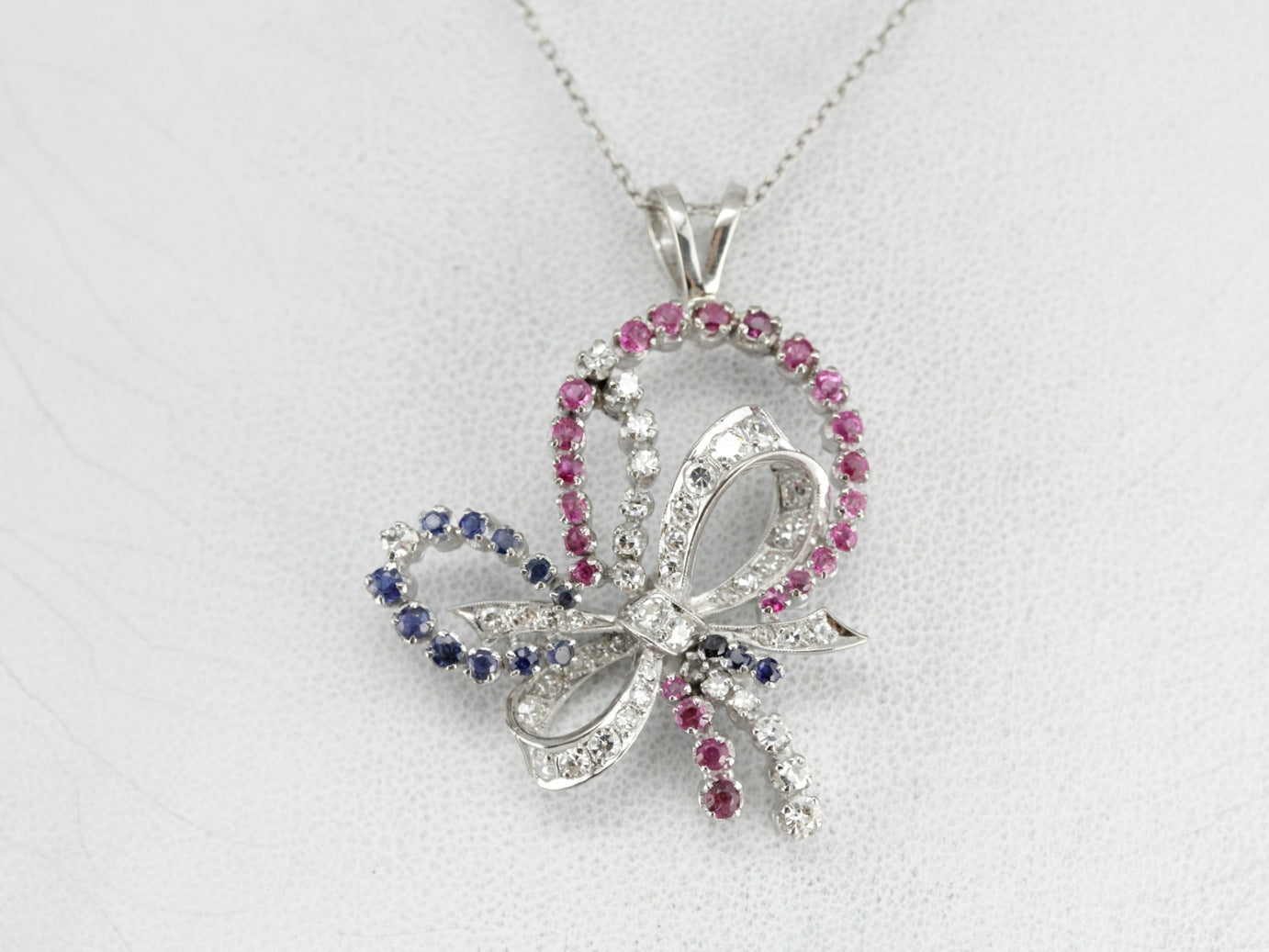 Retro Era Platinum and Diamond Bow Pendant