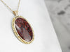 Red Plume Agate Pendant in Yellow Gold