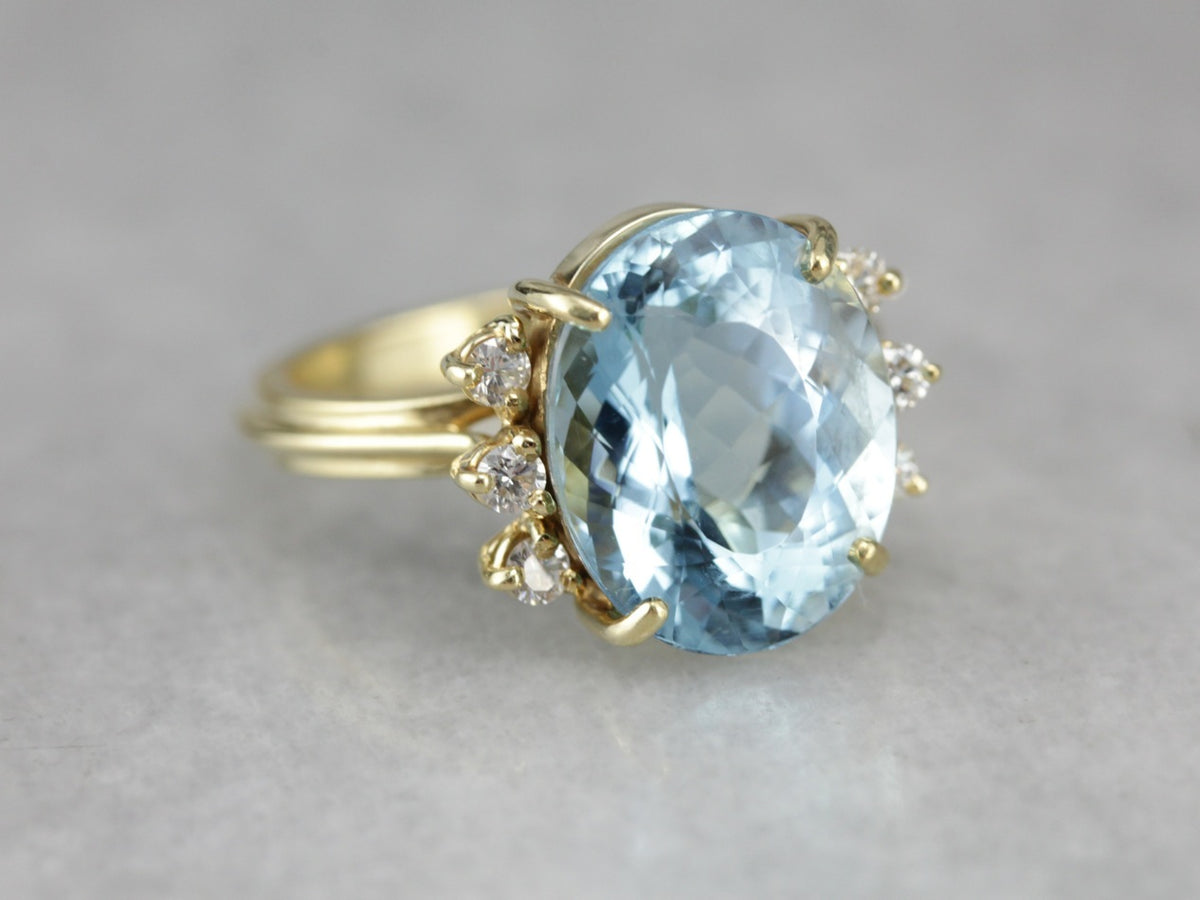 Blue Topaz Cocktail Ring with Diamond Accents