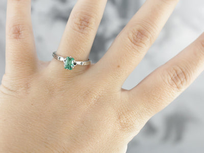 Emerald Engagement Ring in White Gold