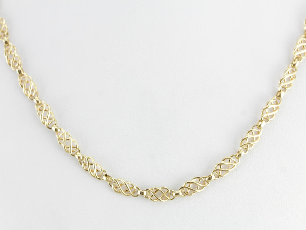 Cadena de oro amarillo con eslabones tejidos