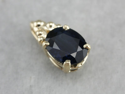 Sapphire and Yellow Gold Pendant